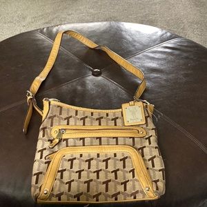Tignanello crossbody bag trimmed in gold leather built in wallet good shape